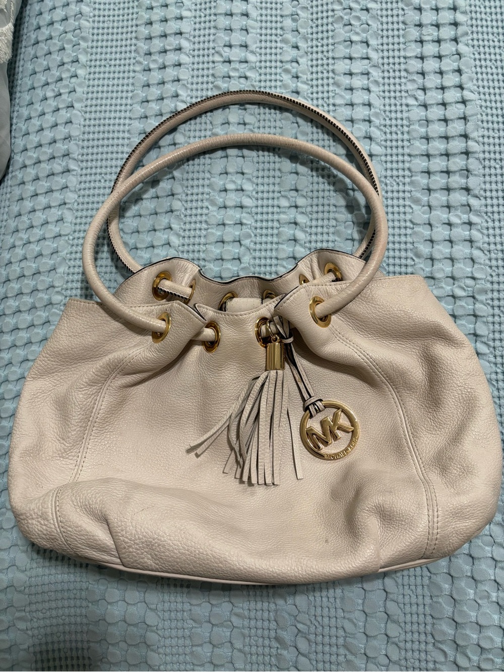 Michael Kors Cream Leather Drawstring Shoulder Bag with Tassel and Gold Hardware